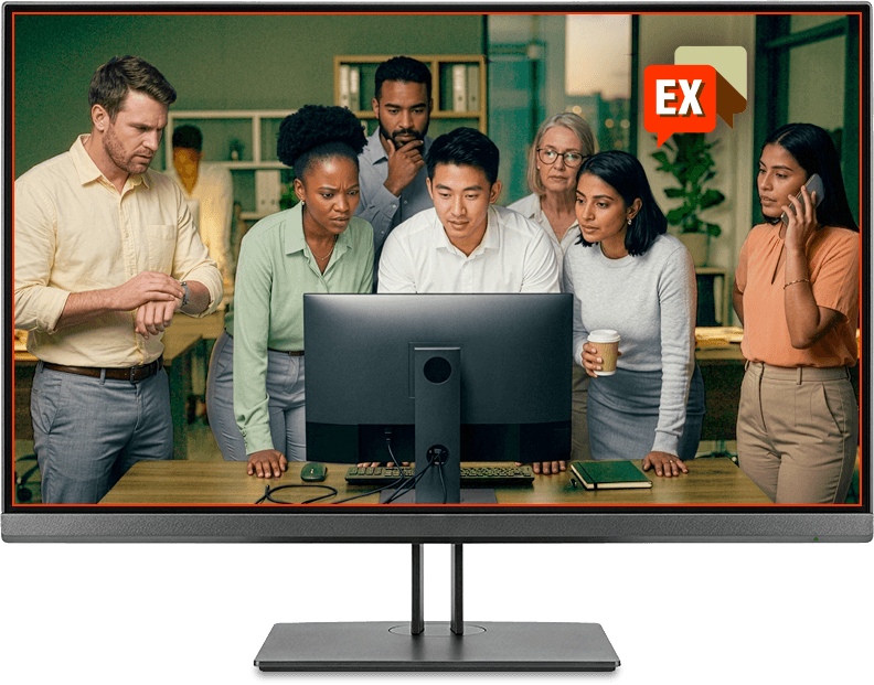 A team collaborating around a computer monitor
